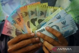 Rupiah akhir pekan masih menguat jelang pidato Powell