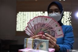 Rupiah Rabu ini menurun di tengah sentimen ekonomi global melambat