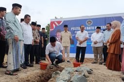 Minister builds kitchen for free meals program at Islamic school