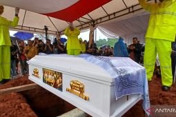 Indonesia buries diplomat shot dead in Peru