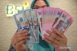 Rupiah menguat seiring euforia kebijakan BI tahan suku bunga