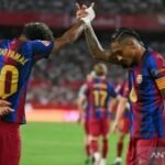 Barca cengkeram puncak klasemen setelah sapu bersih tujuh laga