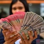 Kamis pagi rupiah menguat menjadi Rp17.713 per dolar AS