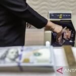 Senin ini rupiah melemah menjadi Rp17.948 per dolar AS
