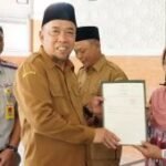 Pemkab Magetan serahkan 451 sertifikat tanah PTSL warga Kartoharjo