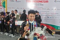 Lifter Rahmat Erwin persembahkan emas untuk keluarga