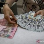 Rabu ini rupiah bergerak datar di kisaran Rp17.992 per dolar AS