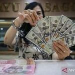 Rabu ini rupiah melemah menjadi Rp18.174 per dolar AS